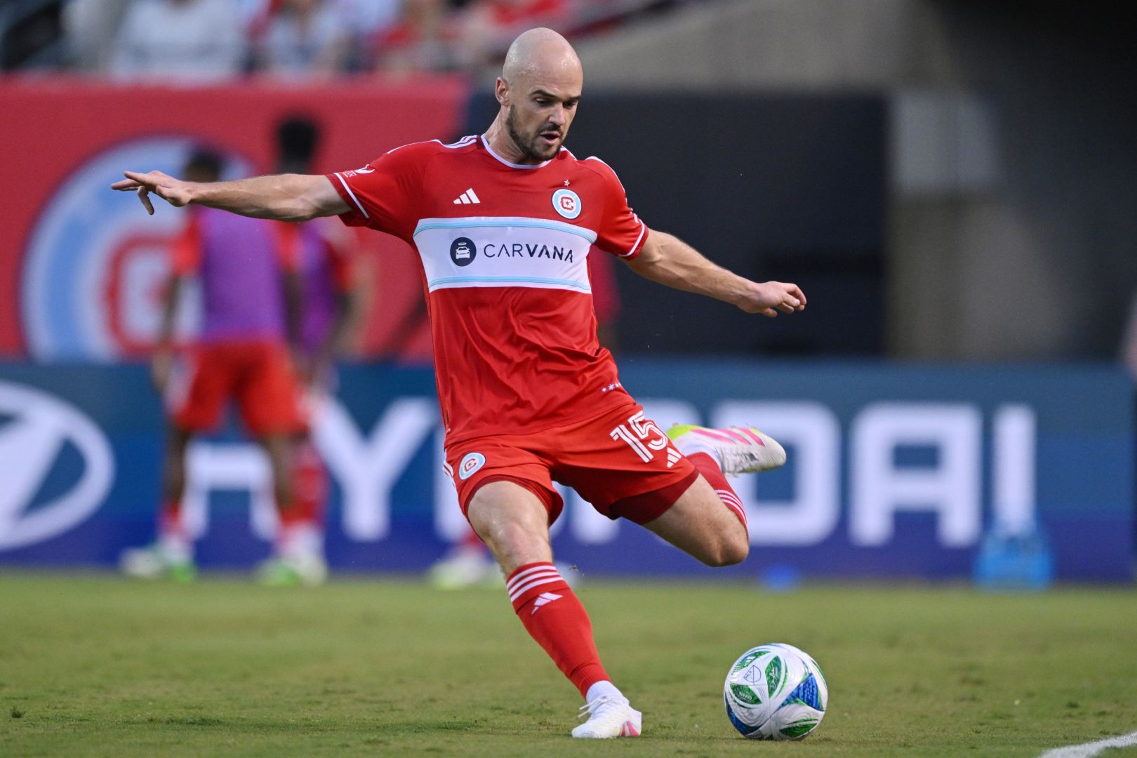 Andrew Gutman playing the ball at Soldier Field against San Diego FC on July 12, 2025