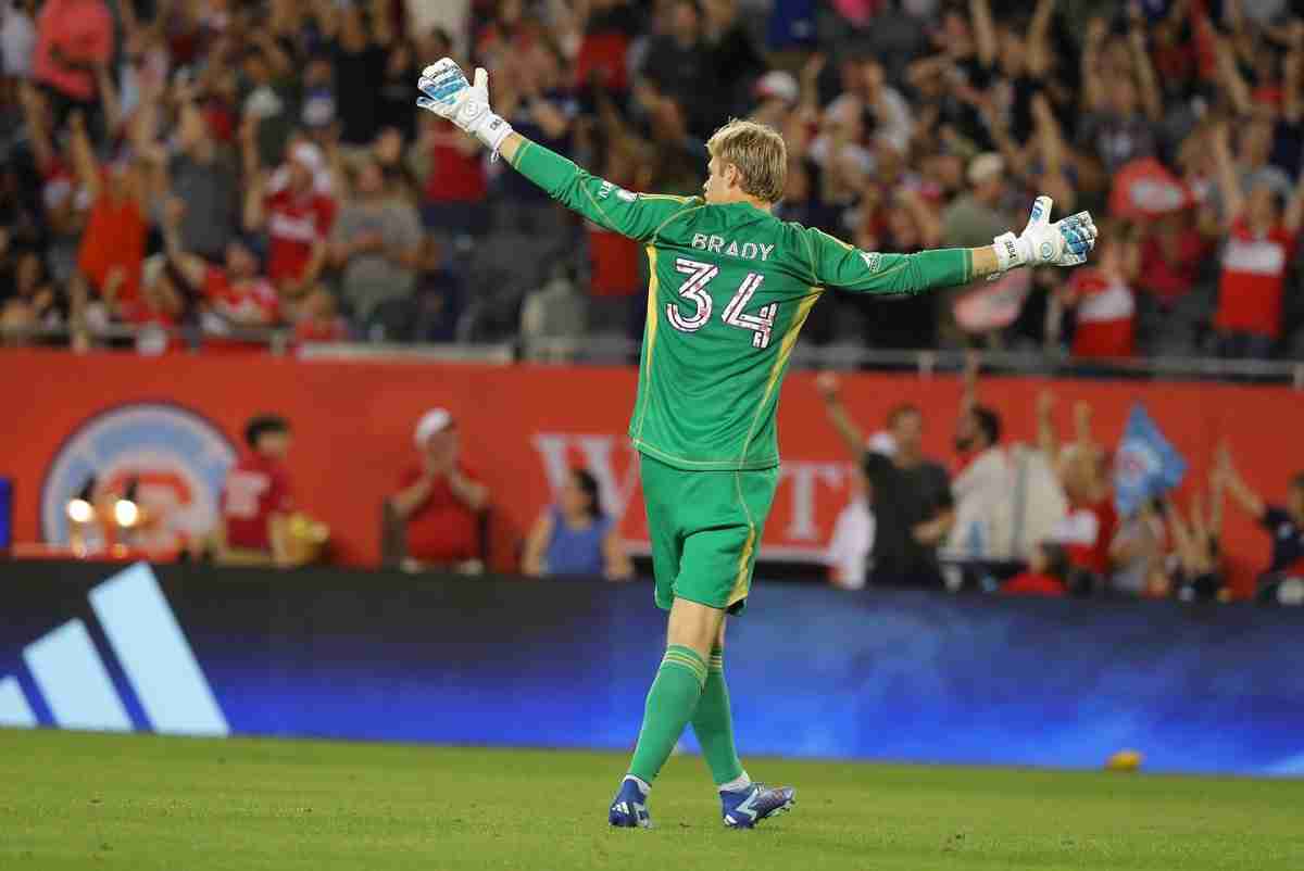 Jul 3, 2024; Chicago, Illinois, USA; Chicago Fire FC goalkeeper Chris Brady (34) reacts after a goal scored by Chicago Fire FC midfielder Gaston Gimenez (30) during the second half against Philadelphia Union at Soldier Field.