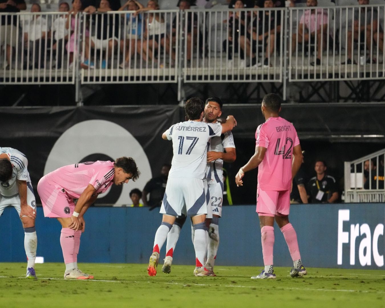 Brian Gutierrez and Mauricio Pineda hug Justin Reynolds after his goal against Inter Miami on September 30, 2025.