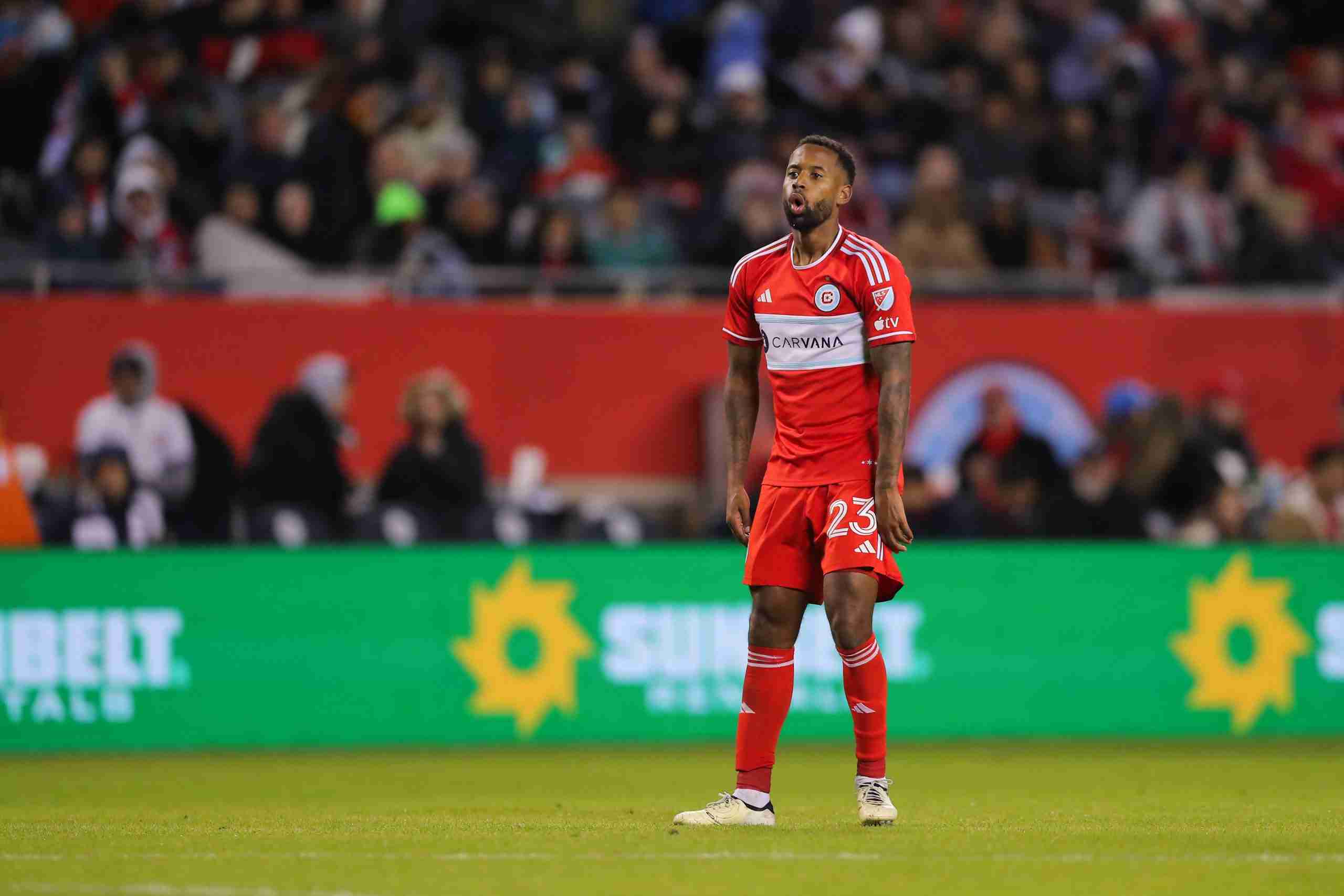 Apr 6, 2024; Chicago, Illinois, USA; Chicago Fire FC midfielder Kellyn Acosta (23) celebrates after midfielder Brian Gutierrez (17) scores during the second half against Houston Dynamo FC at Soldier Field. Mandatory Credit: Melissa Tamez-USA TODAY Sports