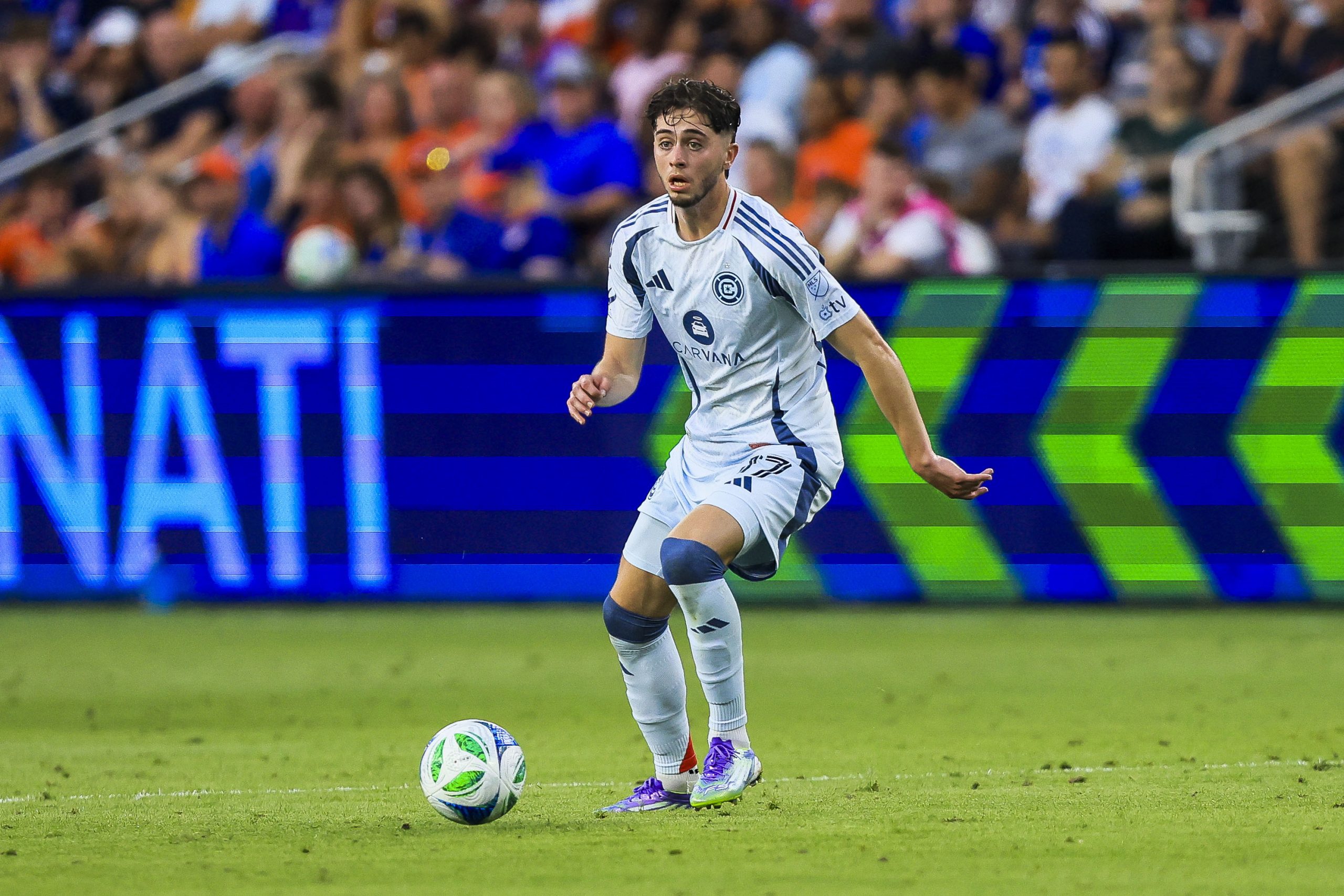 Jul 5, 2025; Cincinnati, Ohio, USA; Chicago Fire FC midfielder Brian Gutierrez (17) dribbles against FC Cincinnati in the second half at TQL Stadium. Mandatory Credit: Katie Stratman-Imagn Images