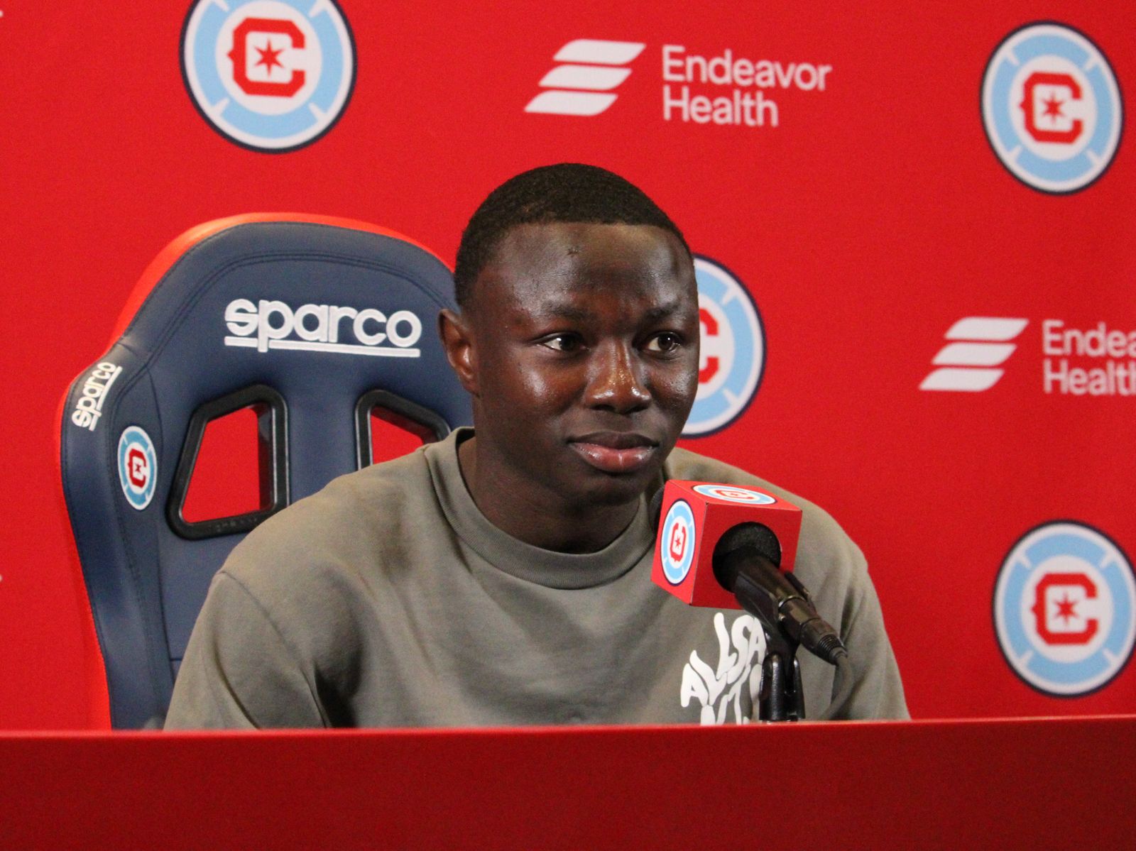 Omari Glasgow speaks to reporters on 5/23/2025