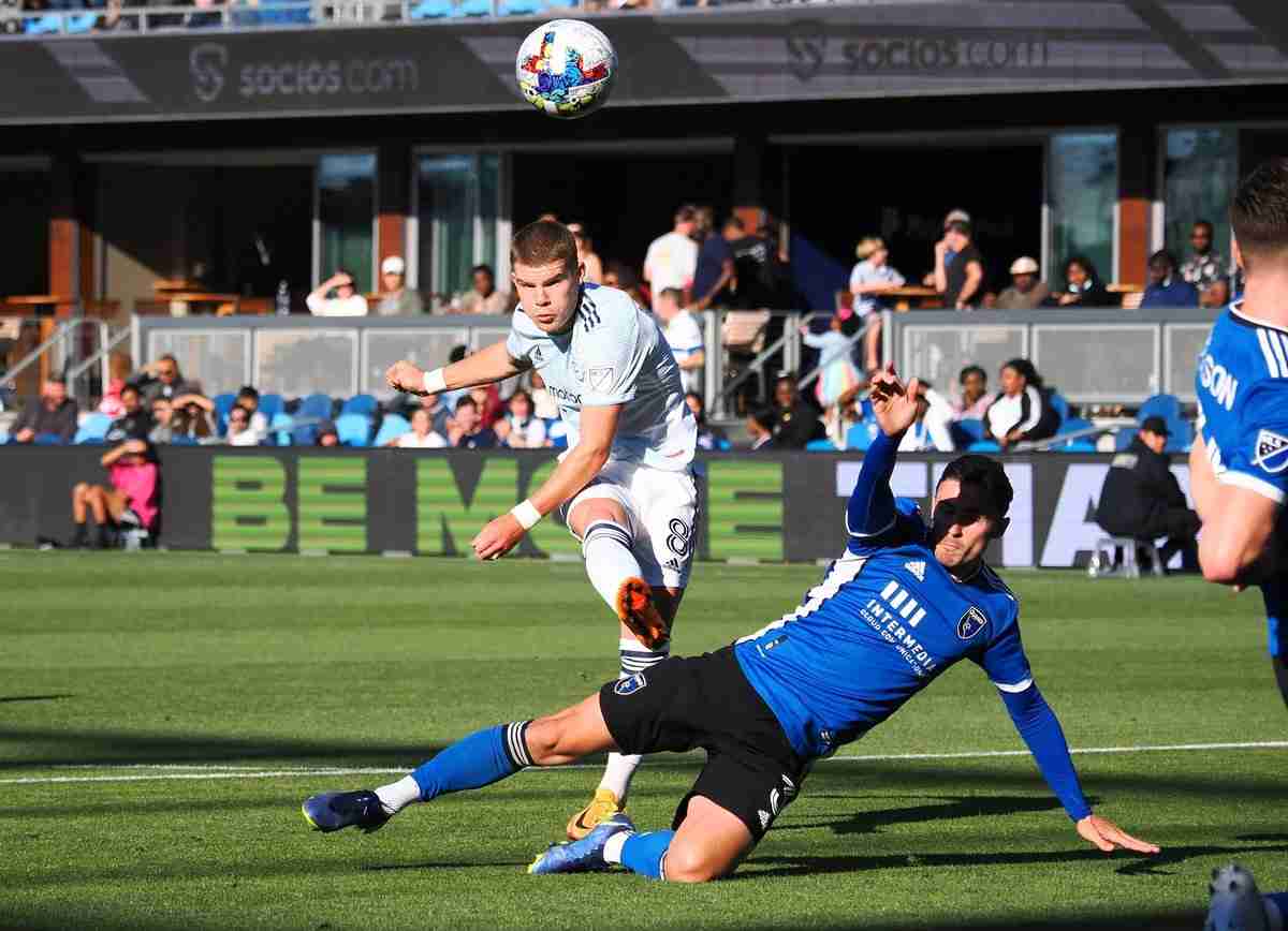 Jul 3, 2022; San Jose, California, USA; Chicago Fire midfielder Chris Mueller (8) shoots against San Jose Earthquakes defende
