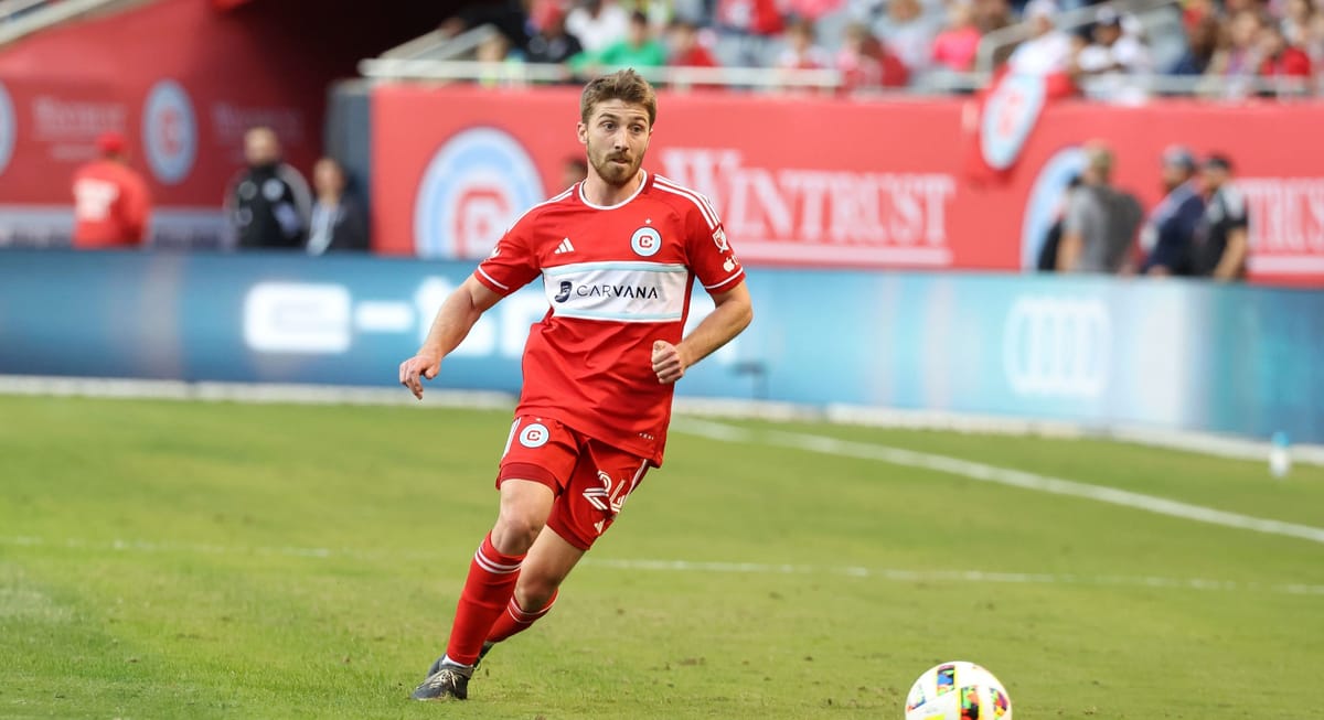 Oct 19, 2024; Chicago, Illinois, USA; Chicago Fire defender Jonathan Dean (24) kicks the ball against the Nashville SC during