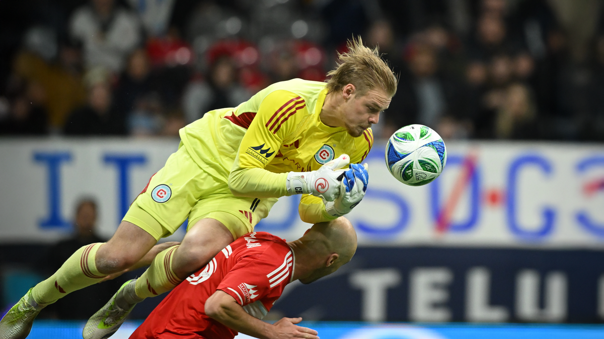 Mar 22, 2025; Vancouver, British Columbia, CAN; Chicago Fire FC goalkeeper Chris Brady (1) blocks a shot on goal during the f