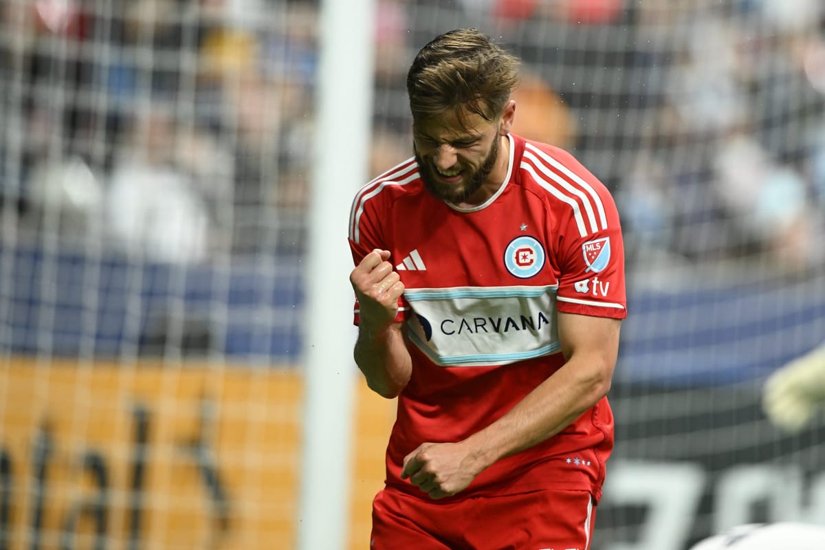 Mar 22, 2025; Vancouver, British Columbia, CAN; Chicago Fire FC forward Philip Zinckernagel (11) celebrates scoring during th