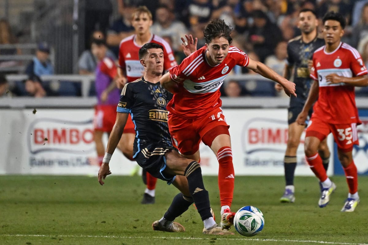 Aug 23, 2025; Chester, Pennsylvania, USA; Chicago Fire midfielder Brian Gutirrez (17) is tackled by Philadelphia Union midfi