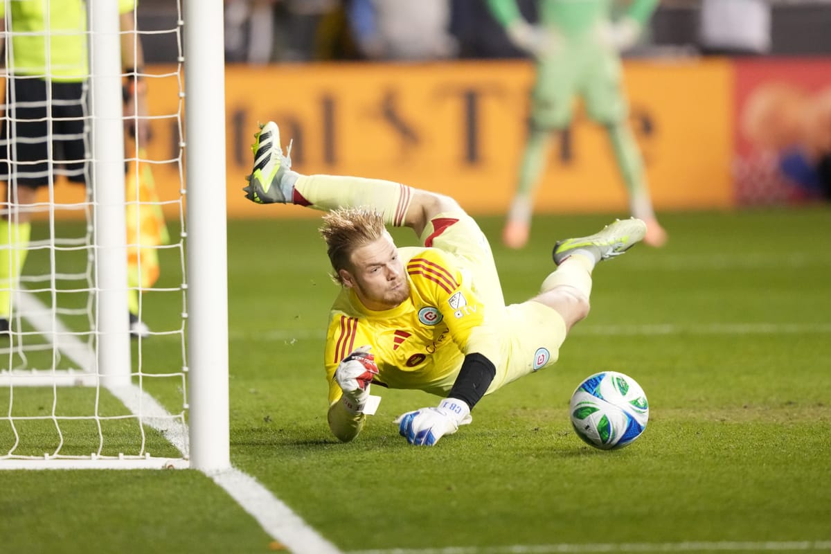 Oct 26, 2025; Chester, Pennsylvania, USA; Chicago Fire FC goalkeeper Chris Brady (1) saves a shootout attempt against the Phi