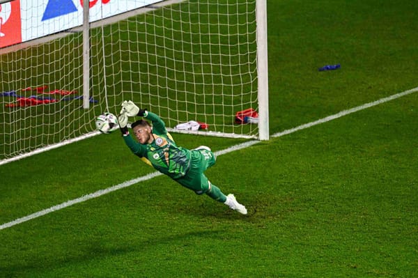 Chicago Fire FC Spencer goalkeeper Richey dives for the ball during a soccer game