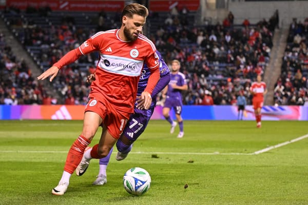 Philip ZInckernagel plays the ball in the Chicago Fire's playoff game against Orlando City on October 22, 2025
