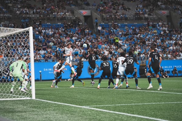 Jack Elliott heads the ball against Charlotte FC on May 17, 2025