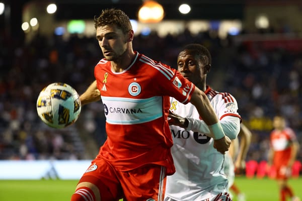Sep 28, 2024; Chicago, Illinois, USA; Chicago Fire FC forward Hugo Cuypers (9) shields the ball against Toronto FC during the