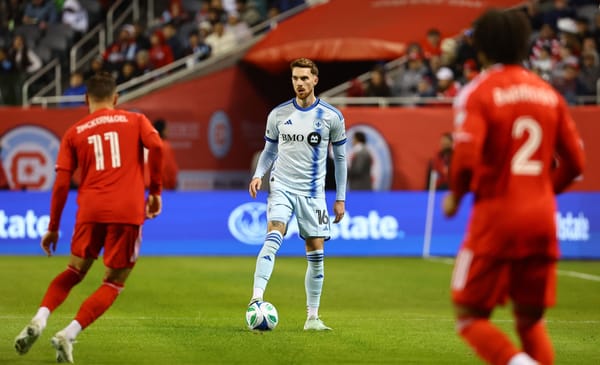 Mar 29, 2025; Chicago, Illinois, USA; CF Montreal defender Joel Waterman (16) kicks the ball against Chicago Fire FC during t
