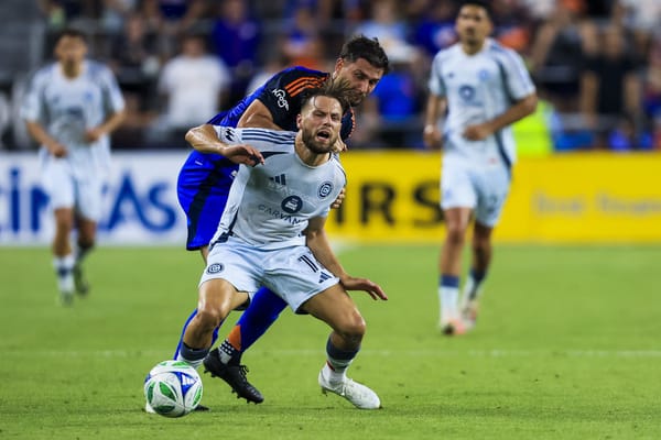 Jul 5, 2025; Cincinnati, Ohio, USA; FC Cincinnati defender Matt Miazga (21) battles for the ball against Chicago Fire FC forw